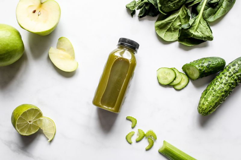 Fresh pressed green juice with spinach and ginger